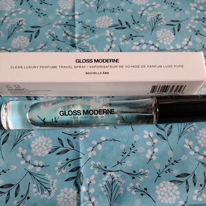 Transparent Rollerball Perfume with Black Cap and Soft Pink Box